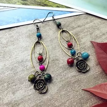 Seaside retro rose earrings, fashionable wings, fringed earrings, femininity, thin face earrings.