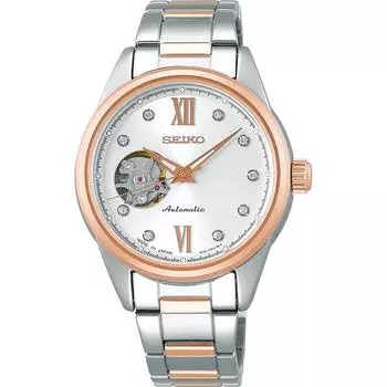 Seiko женские SSDE010 (Женская металлическая группа SEIKO SELECTION) Круглые часы из серебристой нержавеющей стали, аналоговые