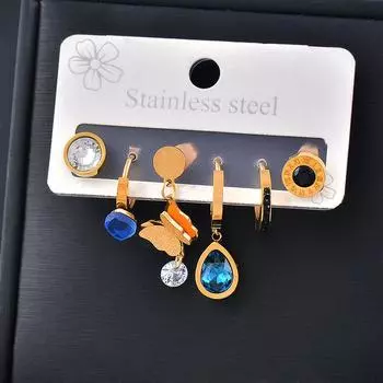 Серьга из титана и титановой стали с синими стразами и бабочкой в виде бабочки