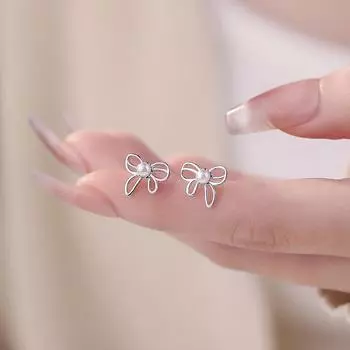 Серьги-бантики — милые и изысканные серьги для проколотых ушей