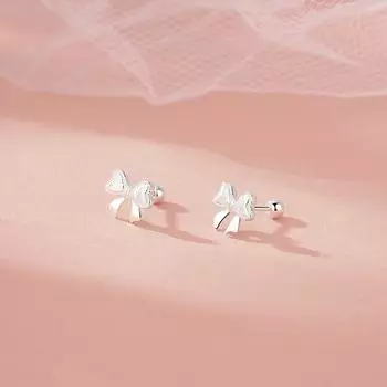 Серьги-бантики Sweet Love для студенток с универсальными функциями профилактики и снятия аллергии