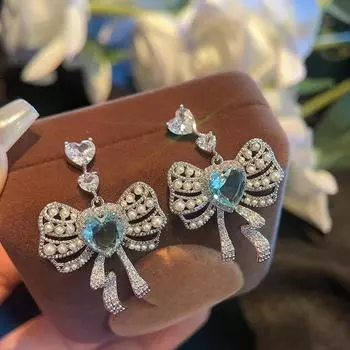 Серьги-бантики в стиле принцессы, серьги-гвоздики с жемчужной лентой, женские темпераментные украшения с легкой инкрустацией из циркония жёлтый