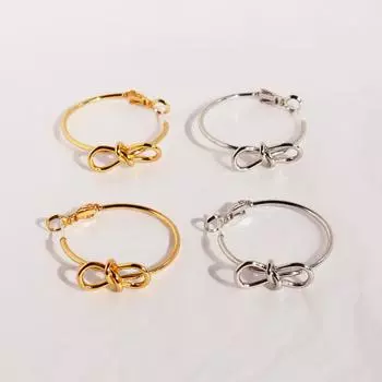 Серьги-бантики женские простые модные завязанные серьги популярные серьги женские 868 золотой