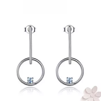 Серьги-гвоздики из полого круглого серебра 925 пробы с небесно-голубым топазом небесно-голубой