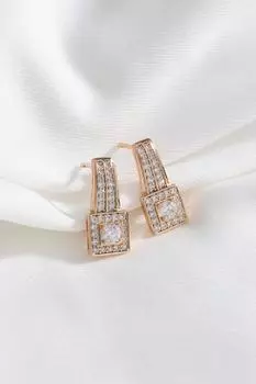 Серьги из каменной стали золотого цвета