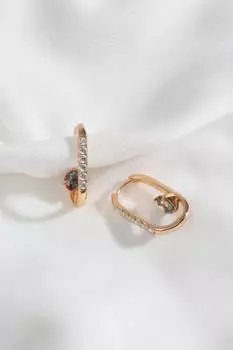 Серьги из стали овальной формы с камнем золотого цвета