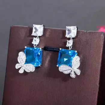 Серьги-капли CMM высокого качества серебряного цвета с бабочкой и голубым цирконием светло-синий