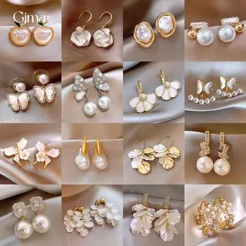 Серьги-кисточки в виде бабочек и цветов из французского циркона. Изысканные и универсальные серьги. Высококачественные серьги.