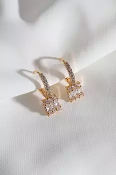 Серьги-кольца багета золотого цвета с цирконом