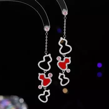 Серьги модные новые легкие роскошные модные элегантные высокие темпераментные длинные кисточки полые тыквенные серьги розового золота