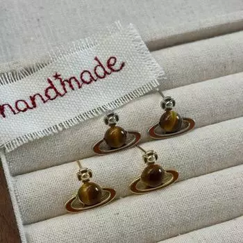 Серьги «Планета Майяра» в стиле ретро: Уникальный, легкий роскошный дизайн для женщин с мягким темпераментом - коллекция 2024 года. Saturn Tiger Eye Earrings коричневый/серебряный