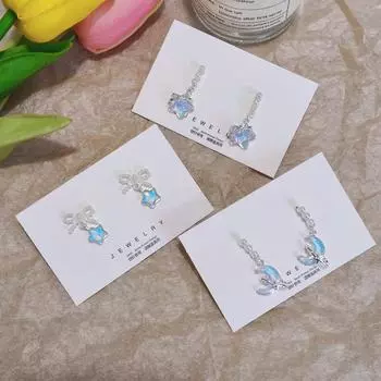 «Серьги-подвески с жемчужиной Blue Star Moon — идеальный вариант для летнего шика» Bow star earrings