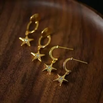 Серьги-подвески в виде звезд из металла с покрытием из 18-каратного золота