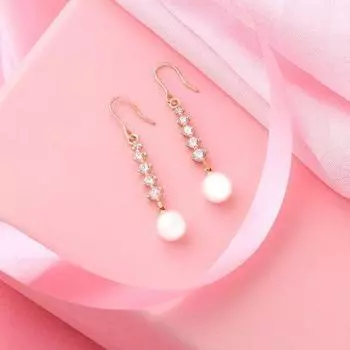 Серьги с кисточками из розового золота и жемчугом