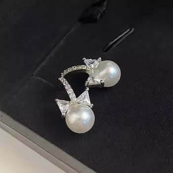 Серьги с жемчугом в виде банта Изысканные маленькие серьги Женский темперамент Продвинутый смысл Универсальные серьги Элегантные серьги-гвоздики из циркония