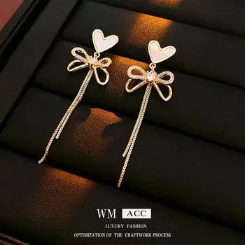 Серьги-сердечки из позолоченного серебра с бантом и кисточкой из циркония — элегантный аксессуар высшего класса Real Gold Electroplating золотой