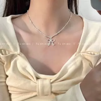 Серебряное спиральное ожерелье-бантик для женщин - минималистичная ключичная цепочка, универсальный и модный аксессуар n0474