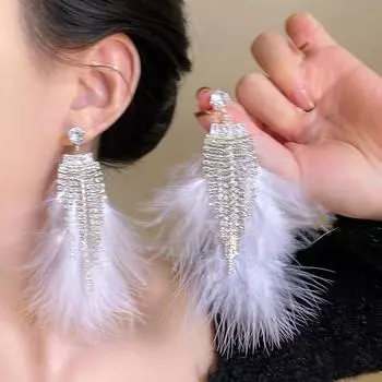 Серебряные серьги-кисточки с перьями и цирконами: Легкая роскошная мода с нишевым, элегантным дизайном для женщин null серебряный