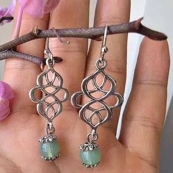 Серебряные серьги Серебряные серьги вечности с кельтским узлом