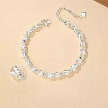 Серебряный браслет - элегантный и очаровательный, подходит для повседневной носки и особых случаев. белый