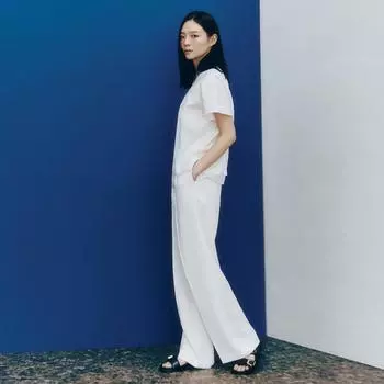 Она пропускает одну защипнутую сзади широкую полоску брюк SwwSlo21040 Camel/55