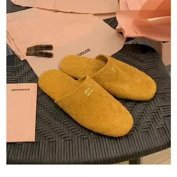Sheepskin version~ Wearing miu fashionable bag head lazy one pedal flat-bottomed slippers women s leather half slippers sandals 35