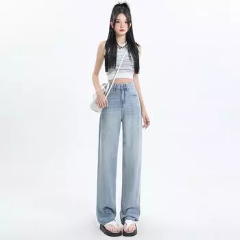 Широкие джинсы из тенселя с высокой талией и узкие брюки прямого кроя в пол. XS светло-синий