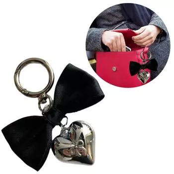 Серебряный брелок-подвеска в виде сердца с бантом. Изысканная подвеска в виде сердца и банта для модных подвесок. разноцветный