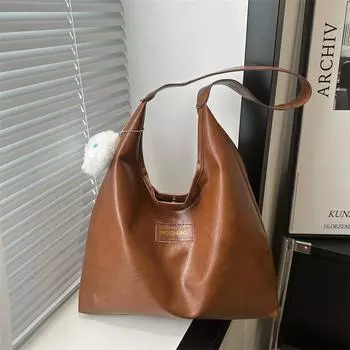 Простая и атмосферная женская сумка для поездок на работу 2024 года, новая однотонная фактурная повседневная сумка-тоут, переносная сумка через плечо