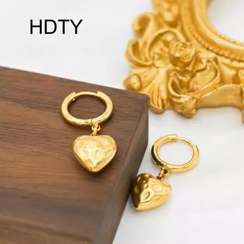 Simple and exquisite niche design concave and convex texture peach heart pendant earrings titanium steel temperament 18k gold earrings золотой