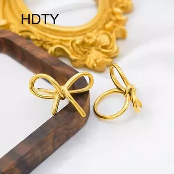 Simple and fashionable commuter bow ring Titanium steel plated 18k gold temperament niche cold ring No. 6 золотой