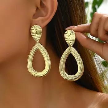 Simple and fashionable commuter wind and water drop earrings, exaggerated personality, hollow niche design, stud earrings, versatile earrings,
