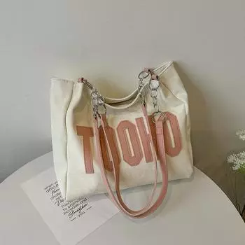 Simple letter shoulder bag 2024 spring new Korean version large-capacity commuter bag fashionable contrasting color casual tote bag розовый