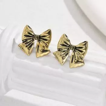 Simple small fresh sweet earrings female personality bow retro niche design stud earrings versatile Internet celebrity earrings