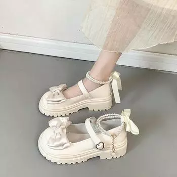 Single shoes women s autumn 2025 new one-word belt bow ribbon beaded small leather shoes round head thick heel high heels 35