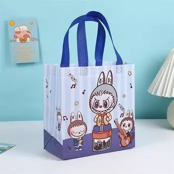Случайный один мультфильм милые монстры Labubu нетканые сумки прочная прочная сумка для хранения детский подарок на день рождения упаковочная сумка сумки