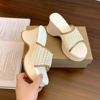 Small thick-soled slippers for women s outer wear 2025 new summer height-increasing one-word drag for women s fashion rhinestone slope heel sandals 35