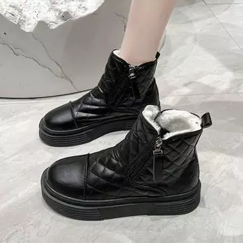 Snow boots women s winter 2025 new soft leather waterproof and non-slip flat-soled short boots large cotton shoes piled thickened Martin boots 35