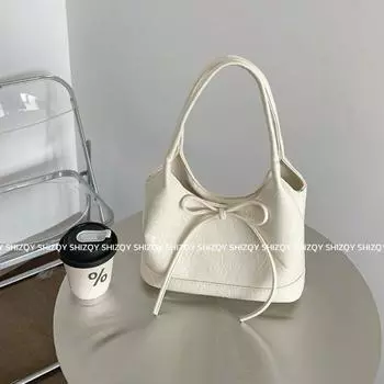 South korea Niche Portable Bucket Bag Women 2025 Summer New Bow Tote Bag Commuter Pleat Shoulder Bag White