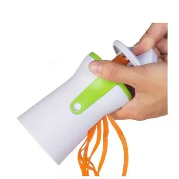 Спиральная измельчитель овощей, нарезанные цуккини, макароны, овощи белый