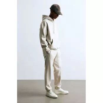 Спортивные брюки свободного кроя HM бежевого цвета