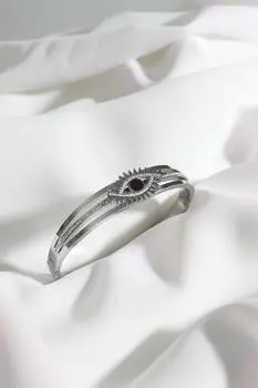 Стальной браслет-наручники серебряного цвета с рисунком глаза