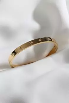 Стальной браслет-наручники золотого цвета со звездой