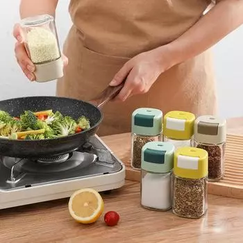 Стеклянная дозирующая бутылка для специй прессового типа