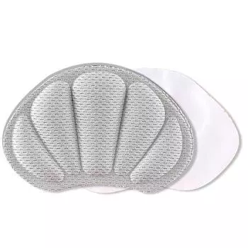 Стелька наклеена на заднюю часть обуви, а противоизносная стелька наклеена на пятку обуви. серый