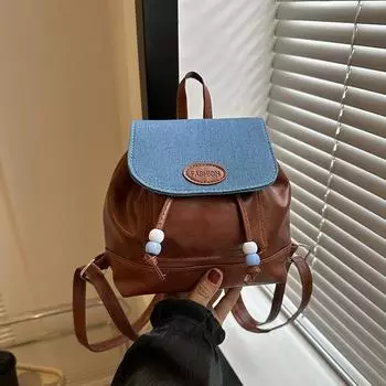 Стильная и простая сумочка 2024 года, начало осени, новый иностранный стиль, для девочек, небольшой рюкзак через плечо в стиле ретро сращивания чёрный