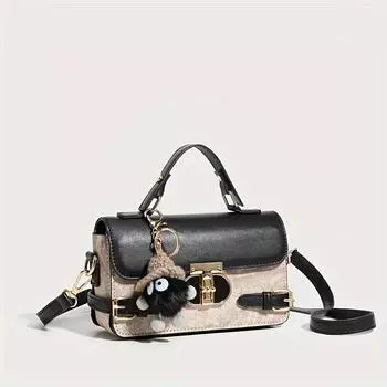 Стильная женская сумка-мессенджер с регулируемыми лямками и поворотным замком для ежедневных поездок на работу.