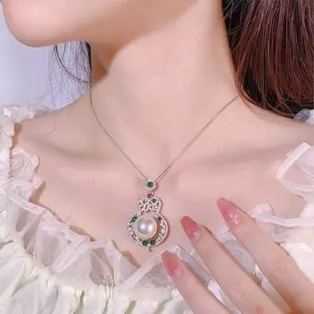 Стильное винтажное ожерелье из рубинового тыквенного жемчуга с подвеской из полого изумрудного кристалла и циркония