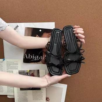 Stylish and simple versatile strap bow with open-toed cool slippers women s summer new flat-bottomed slippers 35