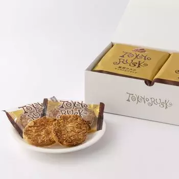 Сухарики Tokyo Rusk с карамелью и миндалем, 16 штук, для роскошного перекуса. Хрустящая и легкая текстура хлеба. Роскошный карамельно-миндальный вкус. Подарок. Подарок.